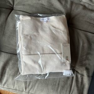 New in bag, good American white long sleeve